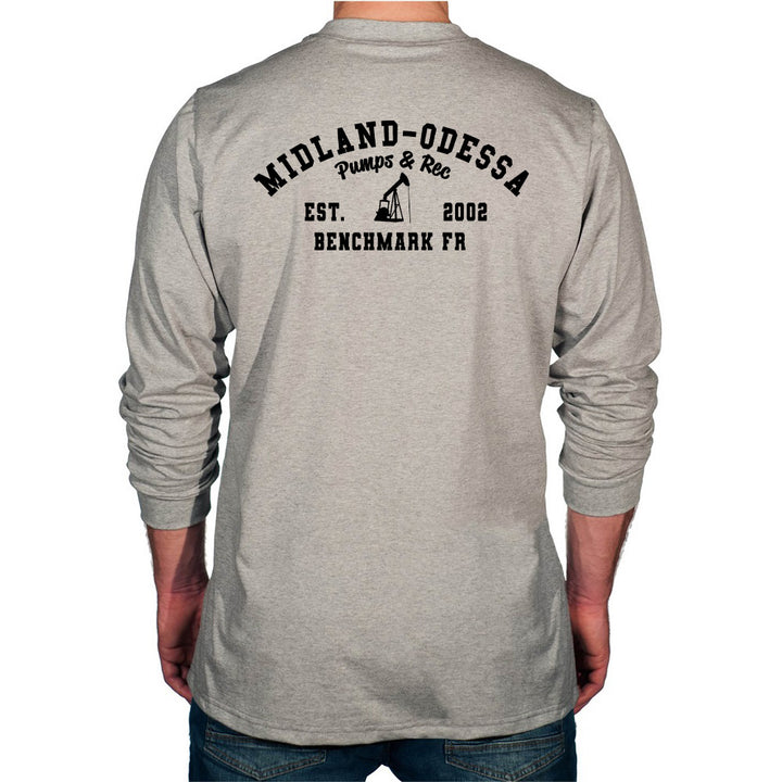 Gray long-sleeve shirt with text and logo on the back, worn by a person.